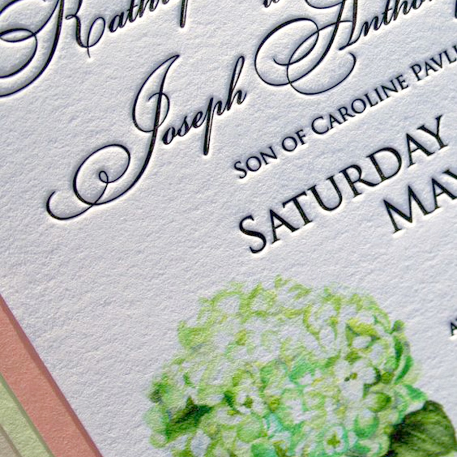 Elegant wedding invitations with letterpress printing and watercolor flowers. www.mospensstudio.com