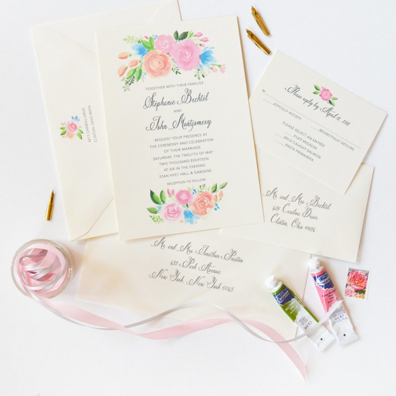 Beautiful floral wedding invitations with peach and pink roses. Perfect for a summer wedding!