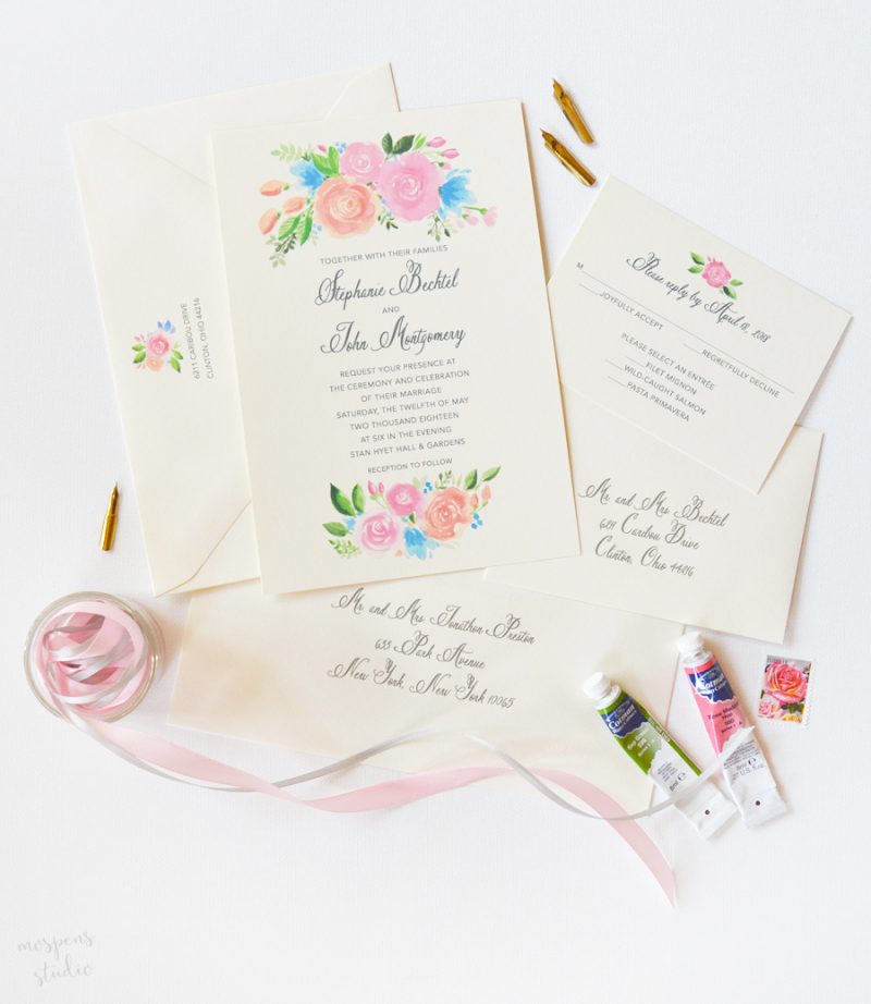 Beautiful floral wedding invitations with peach and pink roses. Perfect for a summer wedding!