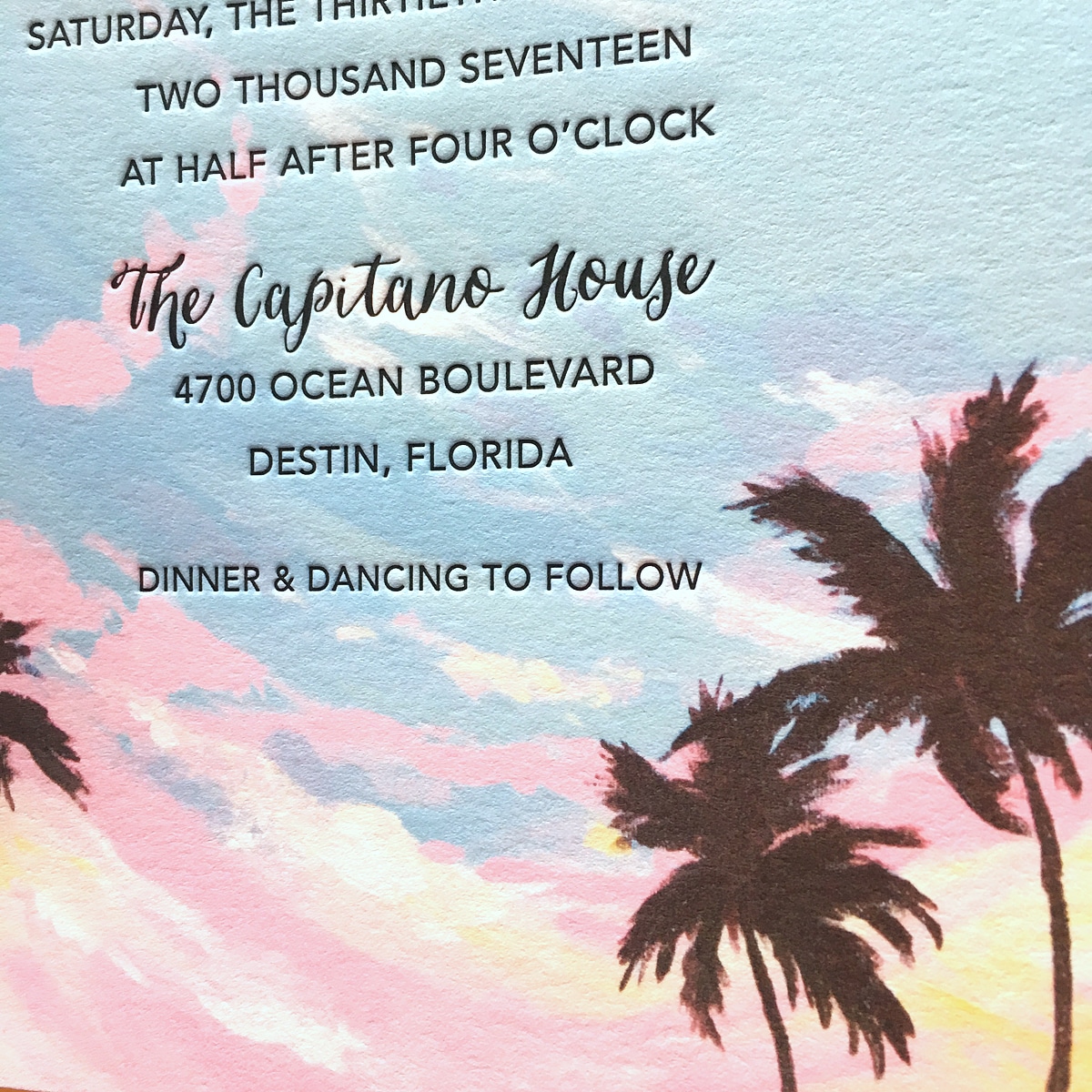 Custom beach wedding invitations featuring hand painted tropical palm trees and sunset. By artist Michelle Mospens. | Mospens Studio