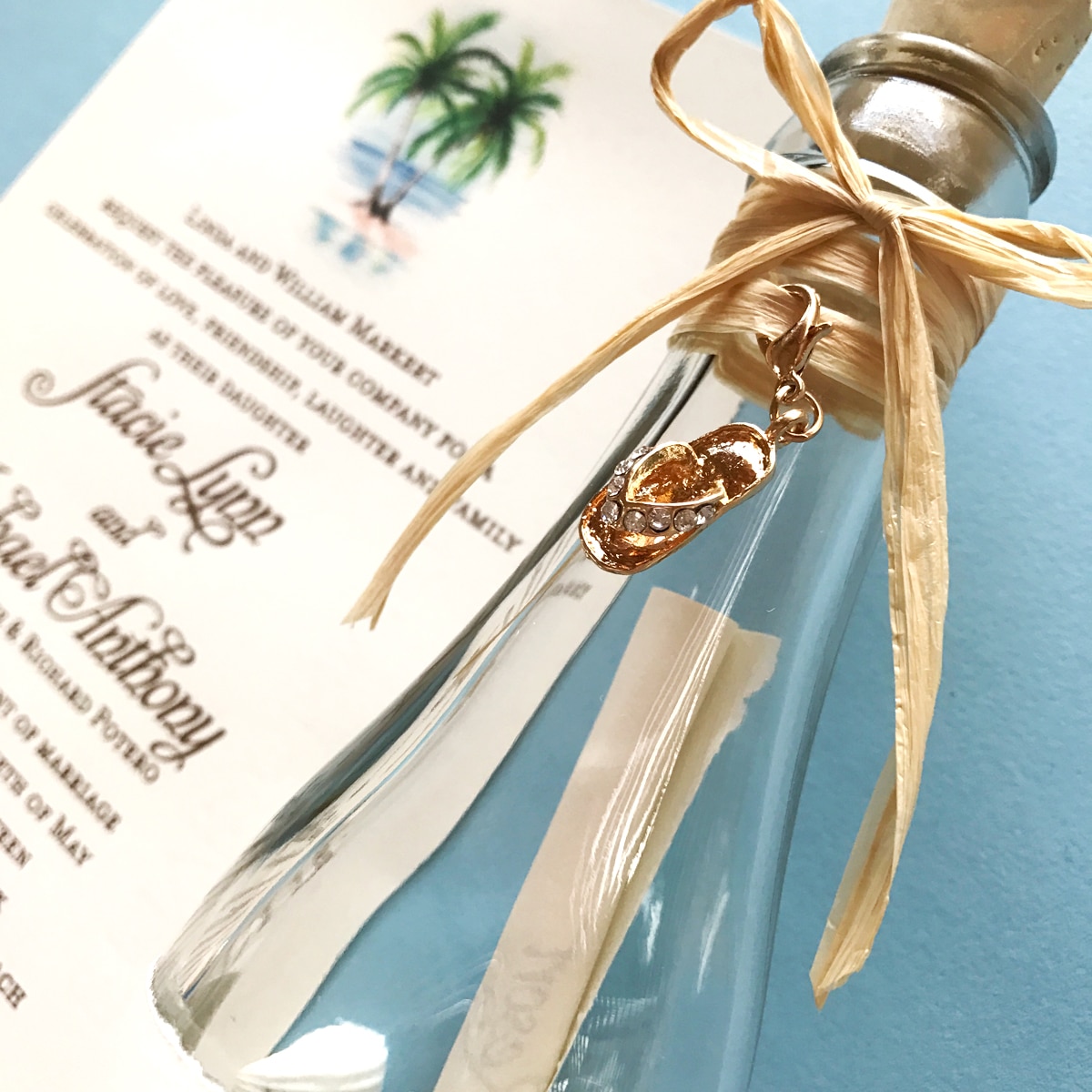 Custom beach wedding invitations in a bottle by artist Michelle Mospens. | Mospens Studio