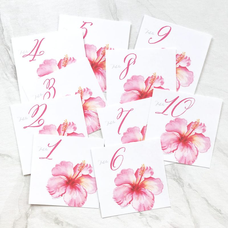 Watercolor tropical hibiscus flower wedding table cards by artist Michelle Mospens. | Mospens Studio