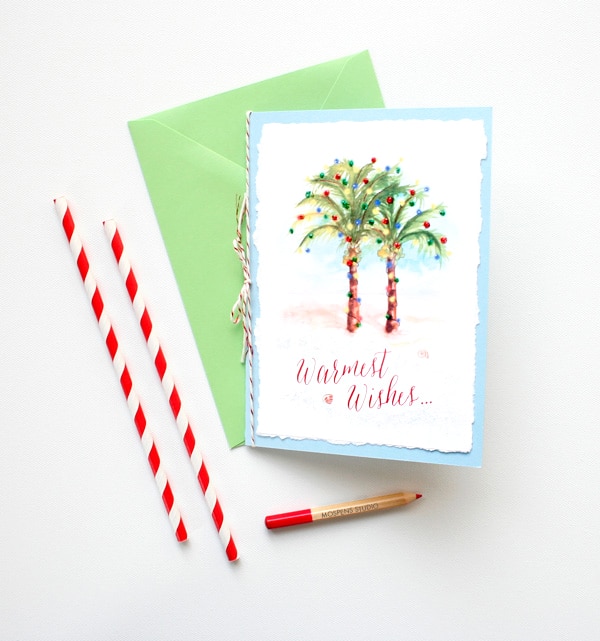 Handmade and hand-painted watercolor palm trees Christmas card by artist Michelle Mospens. | Mospens Studio