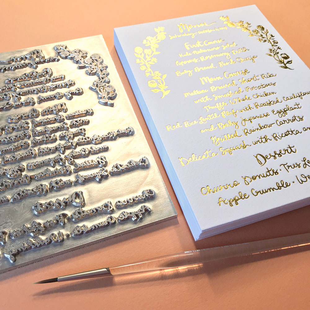 Hand illustrated gold foil modern calligraphy wedding menus by Michelle Mospens. Mospens Studio