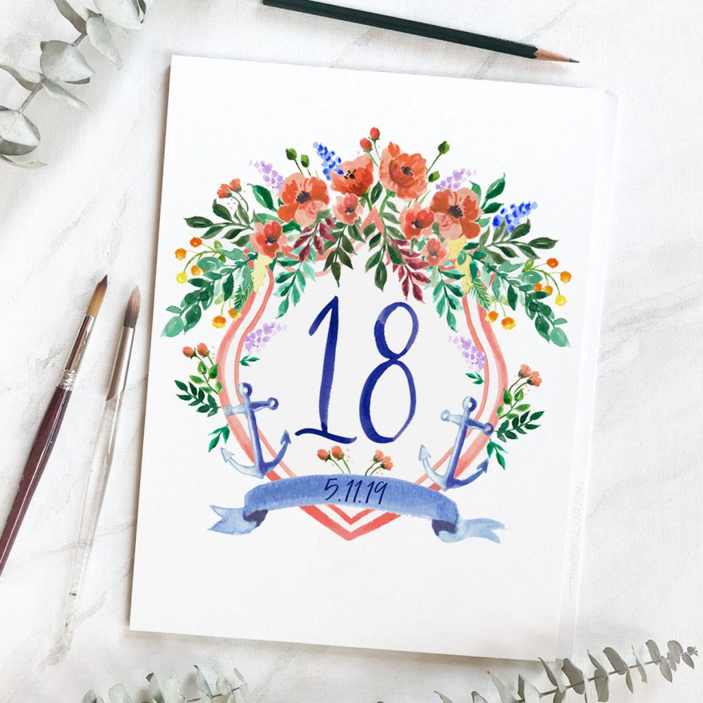 Hand painted nautical wedding crest table cards with hand drawn numbers by artist Michelle Mospens. // Mospens Studio
