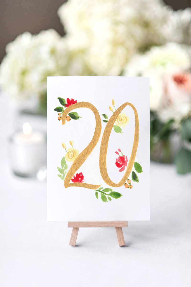 Hand-Painted Floral and Brush Lettering Table Number Cards for your wedding by artist Michelle Mospens. Mospens Studio
