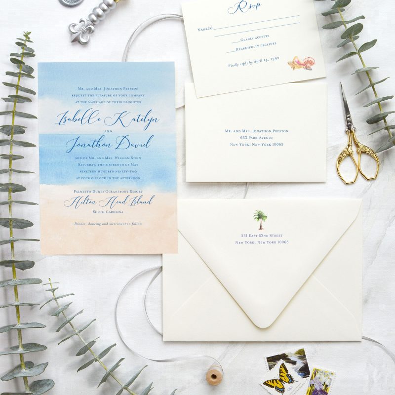 Watercolor beach wedding stationery with painted ocean and beach artwork by artist Michelle Mospens. Mospens Studio